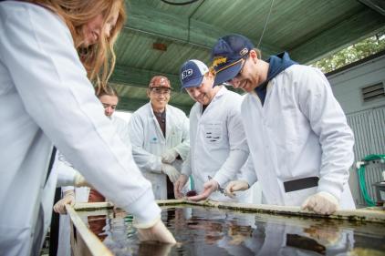 Fish and aqua students in the tank farm