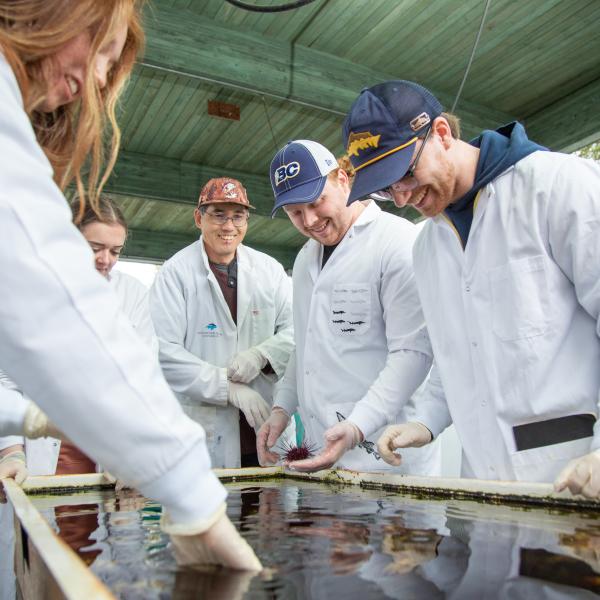 Students and technician at the tank farm