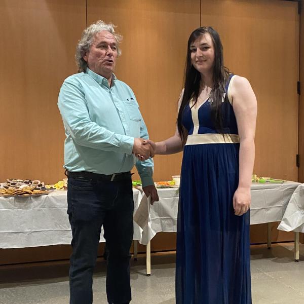 Fish and Aqua student receiving an award in 2024