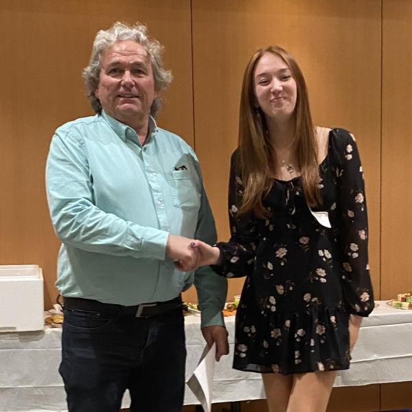 Fish and Aqua student receiving an award in 2024