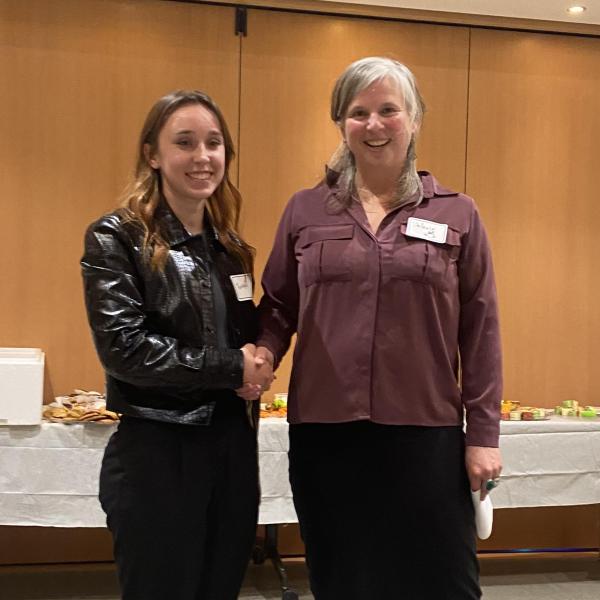 Fish and Aqua student receiving an award in 2024