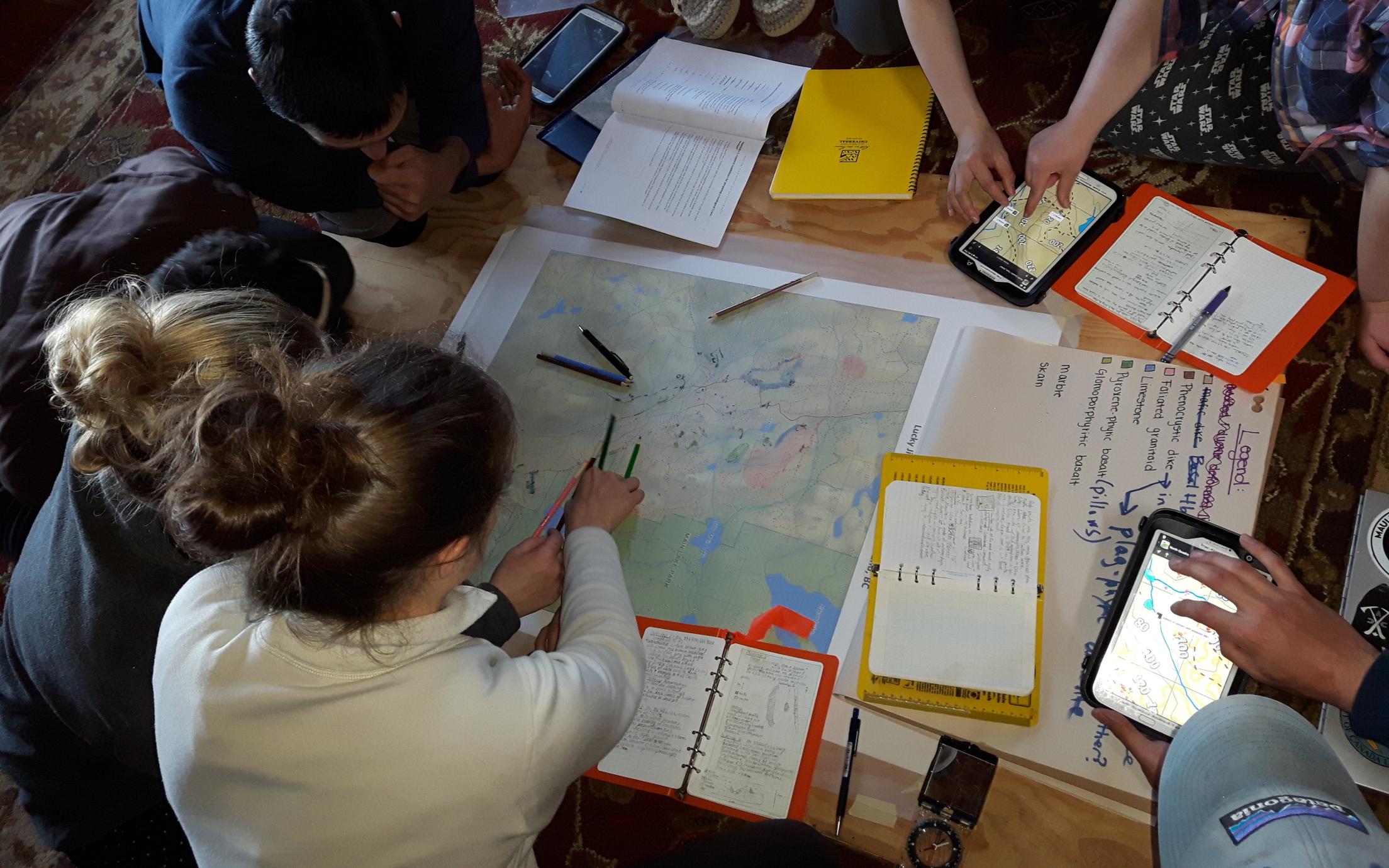 Students collaborating after a day of fieldwork at Geol206 Earth Science Field School
