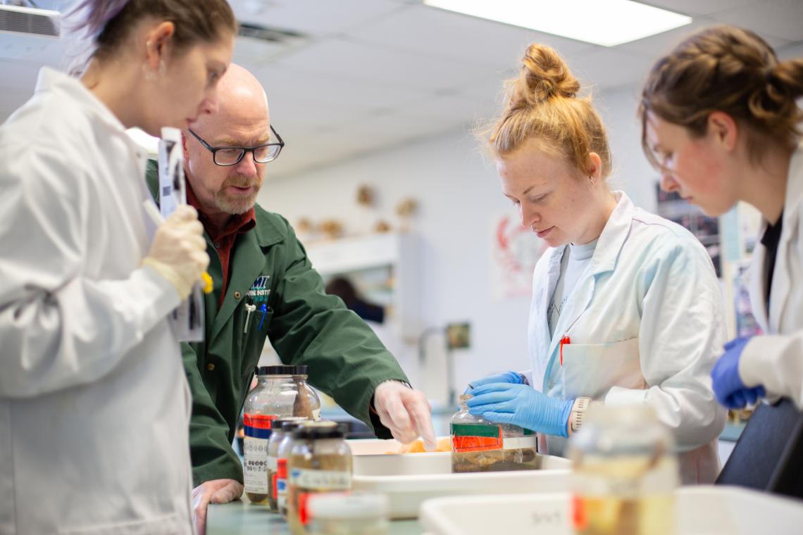 VIU students and professor in the fish biology lab