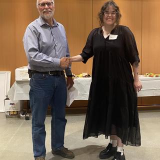 Fish and Aqua student receiving an award in 2024