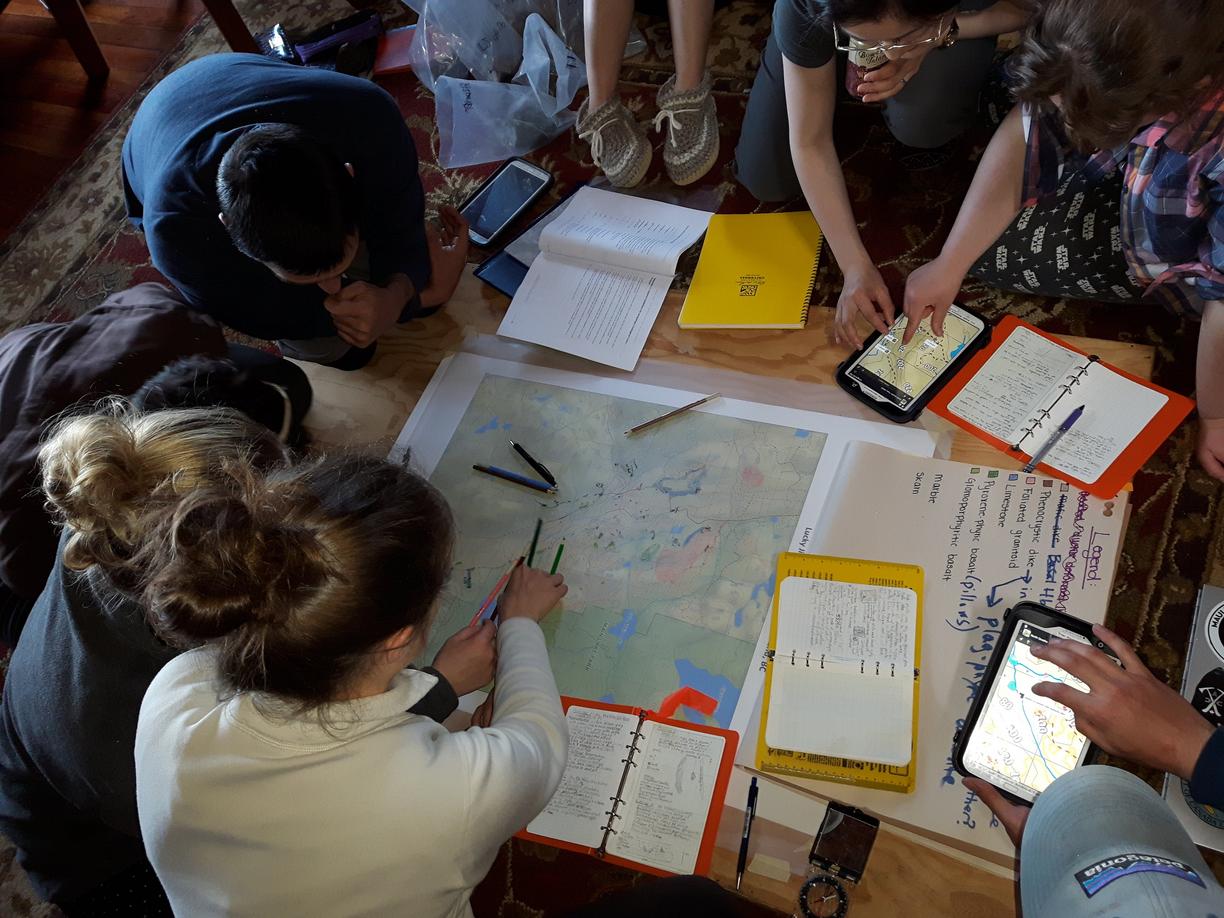 Students collaborating after a day of fieldwork at Geol206 Earth Science Field School