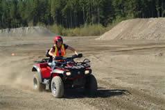 An RMOT student driving an ATV